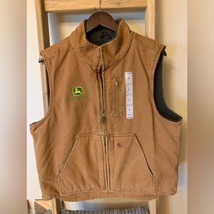 Carhartt brown vest with John Deere logo. Size Large with Sherpa lining.